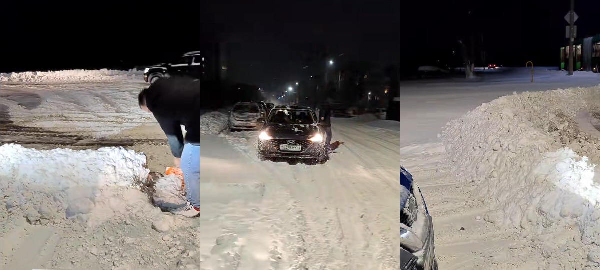 люди чистят снег